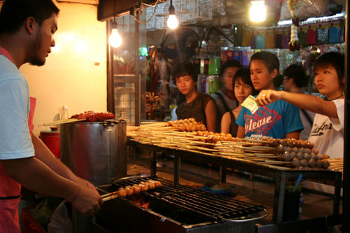 Fish-ball vendor, Chatuchak Weekend Market, Bangkok.