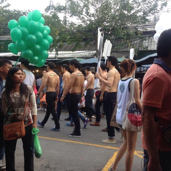 Guerrilla marketing - topless guys at Chatuchak market